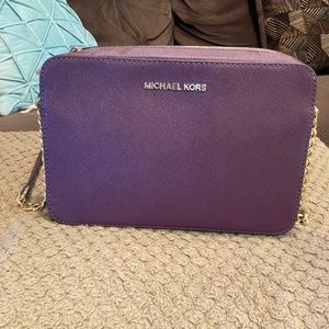 Michael Kors cross body in brand new condition!